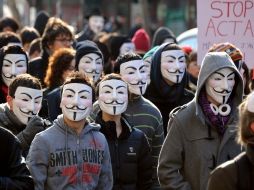 Muchos de los manifestantes portaban máscaras de Guy Fawkes, características del movimiento Anonymous. AFP  /