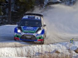 Jari-Matti Latvala supo controlar las condicones de los caminos suecos para quedarse con la victoria. AP  /