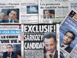 Periódicos franceses que anuncian la candidatura oficial de Sarkozy para las elecciones presidenciales. AFP  /