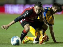 Arturo Paganoni (i) durante juego del sábado ante Tigres. MEXSPORT  /