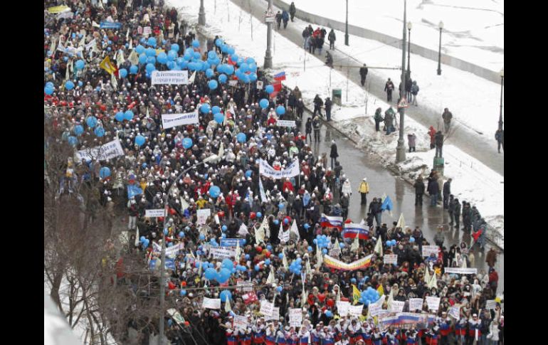 Previo al mitin, 30 mil personas formaron parte de una marcha pro Putin. REUTERS  /