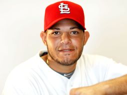 Yadier Molina impulsó 13 carreras en la Serie Mundial donde los Cardenales salieron campeones. AFP  /