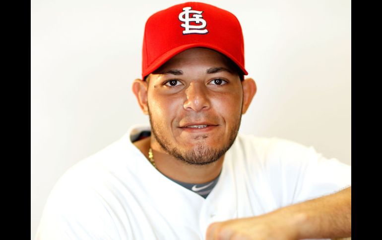 Yadier Molina impulsó 13 carreras en la Serie Mundial donde los Cardenales salieron campeones. AFP  /