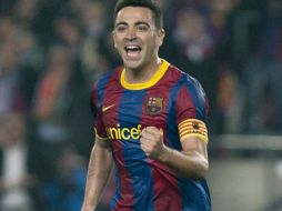 Xavi Hernández es una de las figuras clave en el triunfo del Barcelona en la UEFA Champions League. EFE  /