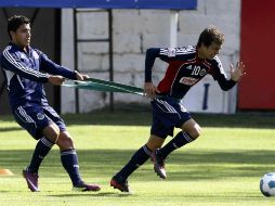 Salazar y Torres durante uno de los entrenamientos de Chivas durante la semana. MEXSPORT  /