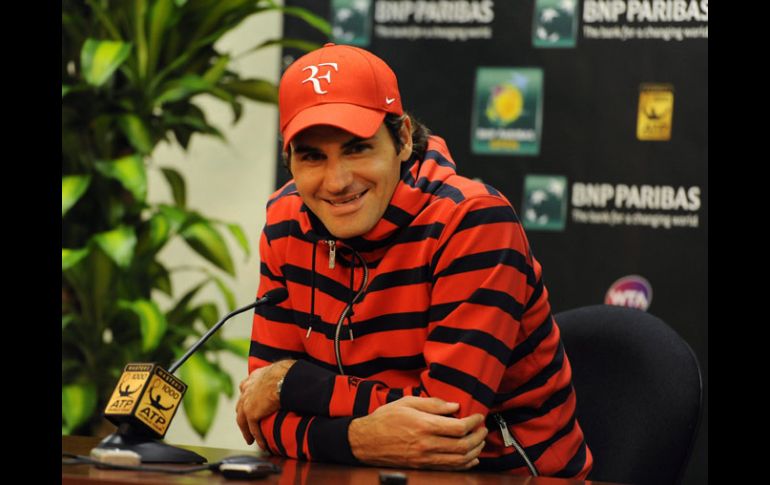 Roger Federer dice que sigue con buen ritmo en el 2012. AP  /