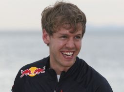 Vettel efectuó el anuncio en el transcurso de un acto de su escudería, en la playa de St. Kilda, en Melbourne. AP  /