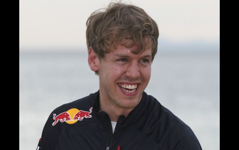 Vettel efectuó el anuncio en el transcurso de un acto de su escudería, en la playa de St. Kilda, en Melbourne. AP  /