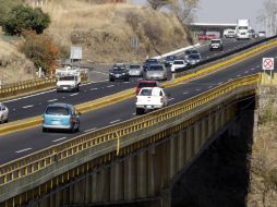 La Policías Federal vigilará los 48 mil kilómetros de carreteras mexicanas. ARCHIVO  /