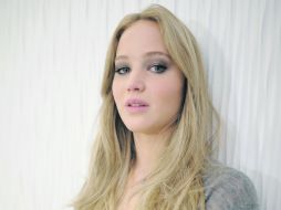 Jennifer da vida a la joven Katniss Everdeen en la cinta ''Los juegos del hambre''. ESPECIAL  /