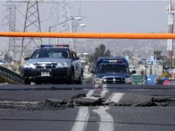 Daños en una avenida de la capital del país, tras el sismo. EFE  /