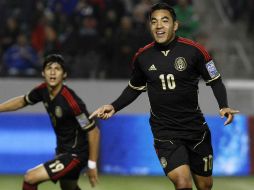 El volante del Tricolor y de las Chivas, Marco Fabián, celebra su primer gol de la noche en la goleada ante Trinidad y Tobago. MEXSPORT  /