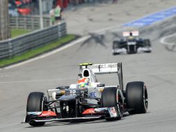 El piloto tapatío, Sergio Pérez, durante la ronda de clasificación en el Circuito Internacional de Sepang. AFP  /