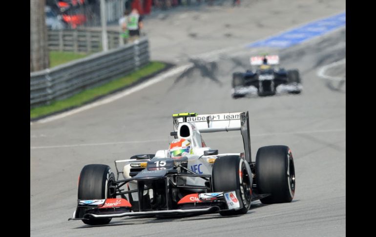 El piloto tapatío, Sergio Pérez, durante la ronda de clasificación en el Circuito Internacional de Sepang. AFP  /