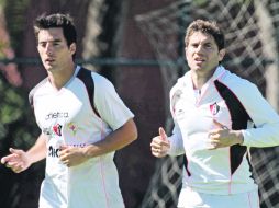 Las expulsiones de Facundo Erpen (i) y de Leandro Cufré (d) le han pesado al Atlas. MEXSPORT  /