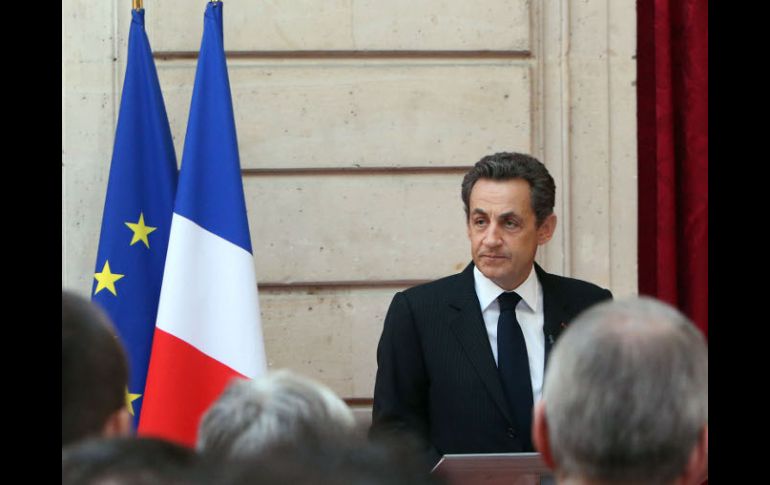 El presidente francés Nicolas Sarkozy advirtió que las autoridades impedirían la difusión por parte de cualquier otra cadena. AP  /