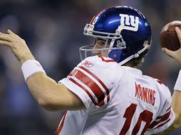 Eli Manning buscará la victoria en casa en el arranque de la temporada de la NFL ante Dallas. AP  /