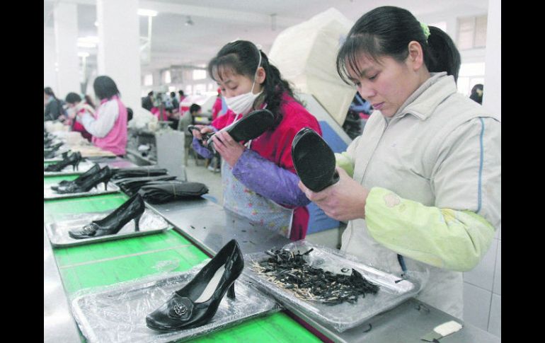 Al alza.- Los industriales del zapato afirman que las importaciones chinas crecieron 151% en el primer mes de 2012. AFP  /