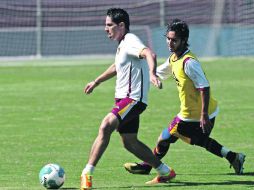 El “Tepa” Solís conduce un balón, durante la práctica del equipo universitario en el Tres de Marzo. MEXSPORT  /