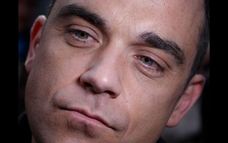 Robbie Williams anuncia emocionado el nacimiento de su primogénito. ARCHIVO  /