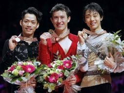 El podio lo completaron los japoneses Daisuke Takahashi (259.66) y Yuzuru Hanyu (251.06). AFP  /