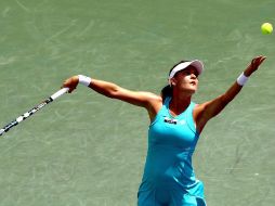 La polaca más sobria en su juego desde el fondo, aguantaba las embestidas de la segunda favorita en el torneo. AFP  /