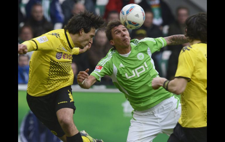 Acción del partido entre el Borussia Dortmund y el Wolfburg de la liga alemana. AFP  /