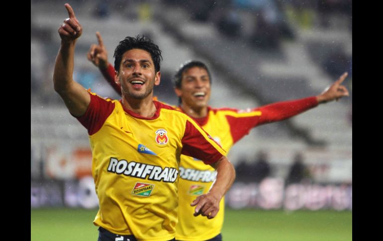 Rafael Márquez del Morelia celebra su anotación en el partido ante Pachuca. AFP  /