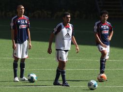 Los jugadores de Chivas durante el entrenamiento del jueves en el Omnilife. MEXSPORT  /