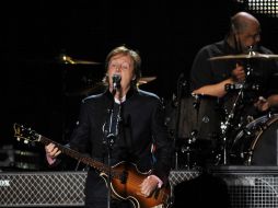 McCartney, vestido de un impecable traje oscuro y una camisa rosada mostró gran profesionalismo. AFP  /