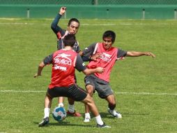 Jugadores de Atlas durante la práctica de esta mañana.  /