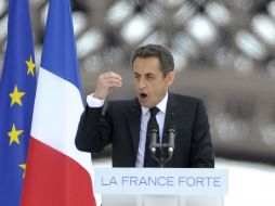 El presidente de Francia y candidato a su relección, pronunció un discurso durante un acto electoral celebrado hoy en París. EFE  /