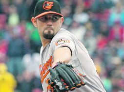 El abridor de Baltimore, Jason Hammel, limitó el ataque de Boston en seis entradas y dos tercios de labor. AFP  /