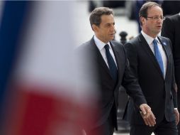 El socialista François Hollande (d), presidente electo de Francia y el mandatario Nicolas Sarkozy. EFE  /