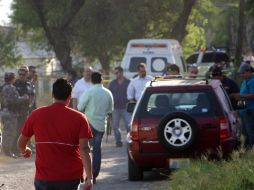 Los restos de al menos 15 personas fueron hallados en dos camionetas en el municipio de Ixtlahuacán de Los Membrillos. NTX  /