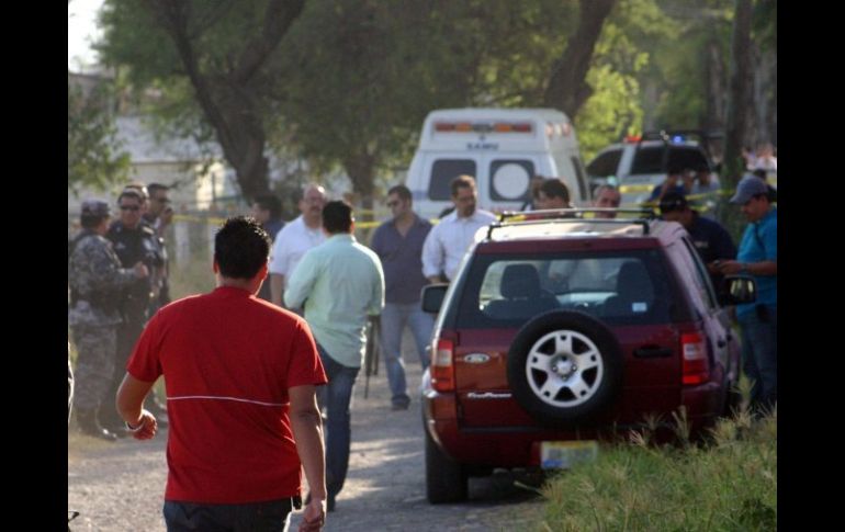 Los restos de al menos 15 personas fueron hallados en dos camionetas en el municipio de Ixtlahuacán de Los Membrillos. NTX  /