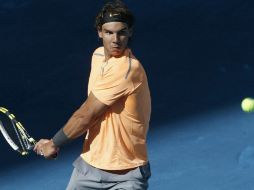 Tras perder y quedar fuera del torneo, Rafael Nadal aseguró que si no cambiaban la cancha no volvería al torneo el siguiente año. EFE  /