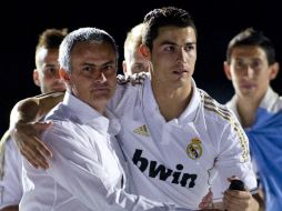 Mourinho y Cristiano (d) durante la celebración del título de Liga para el Real Madrid. AFP  /