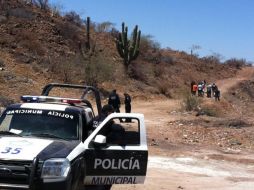 La policía asegura el área donde el cuerpo de Ávila García fue encontrado. AP  /