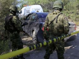 Efectivos de la Sedena mantienen labores de investigación en Nuevo Léon. AFP  /