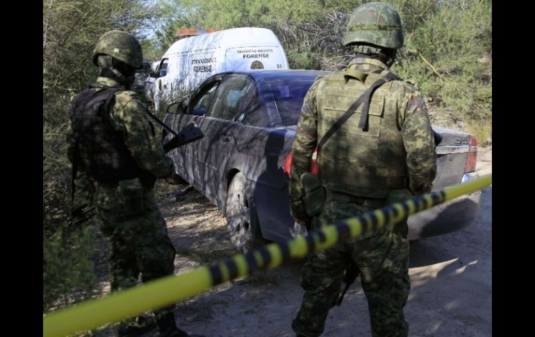 Efectivos de la Sedena mantienen labores de investigación en Nuevo Léon. AFP  /