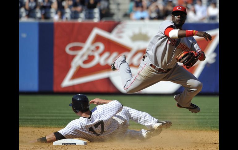 Acción del partido en el Yankee Stadium entre los Cincinnati y Nueva York. AP  /