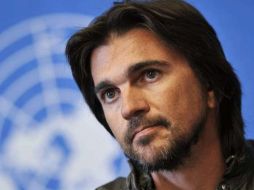 Juanes se compromete a luchar contra esas armas. AFP  /