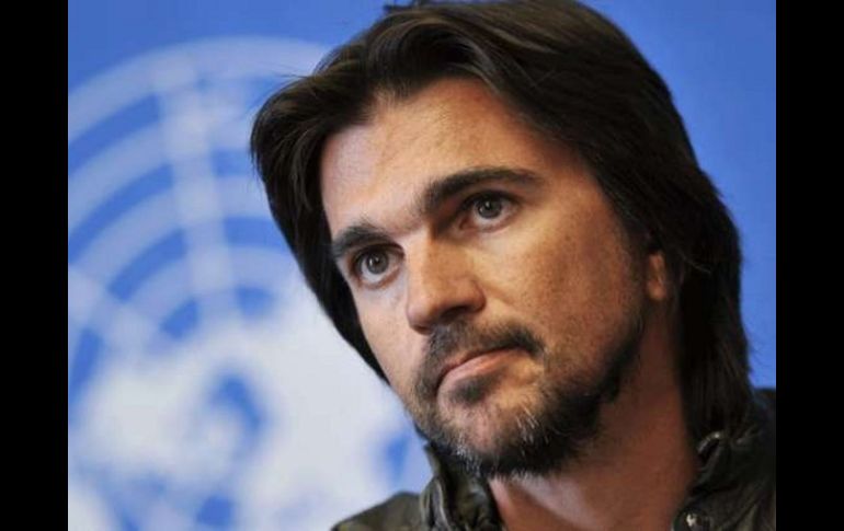 Juanes se compromete a luchar contra esas armas. AFP  /