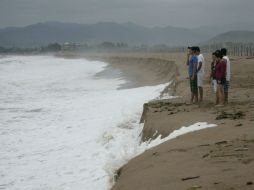 La nubosidad del sistema es débil y escasa, aunque aún se presenta algo de lluvia, en las playas de Jalisco. REUTERS  /