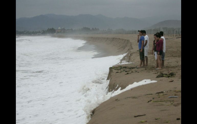 La nubosidad del sistema es débil y escasa, aunque aún se presenta algo de lluvia, en las playas de Jalisco. REUTERS  /