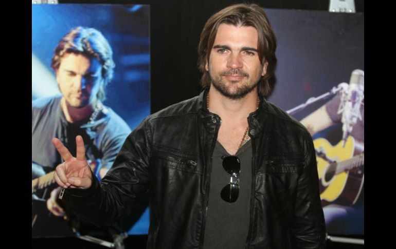 Juanes en conferencia de prensa descarto la posibilidad de grabar un disco totalmente en inglés. NOTIMEX  /