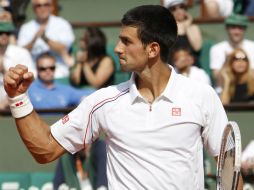 Djokovic celebra tras ganar el enfrentamiento con el esloveno Potito Starace. REUTERS  /