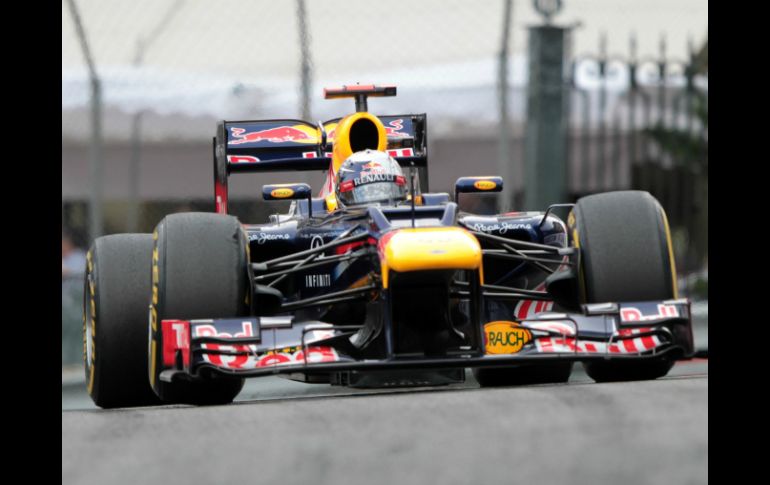 El piloto alemán Sebastian Vettel, campeón mundial de Fórmula uno, se siente ''muy feliz'' en el equipo Red Bull. AFP  /