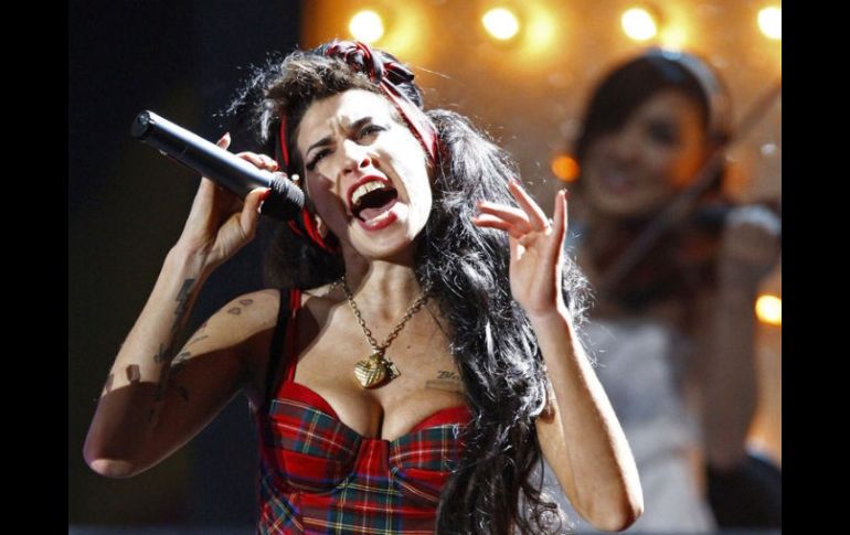 Diez meses después de la muerte de la cantante Amy Winehouse, su familia ha puesto a la venta su casa. ARCHIVO  /